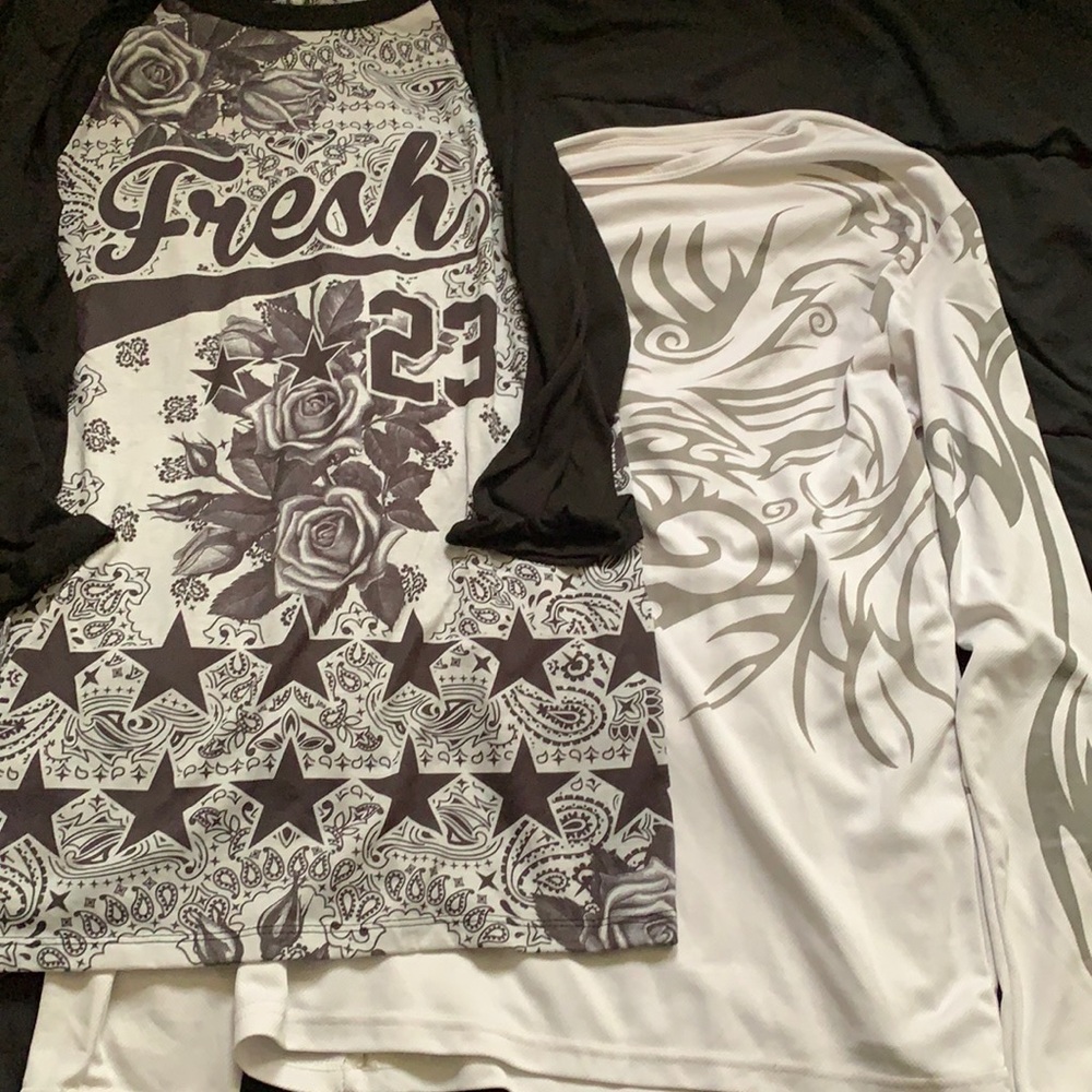 2 large mens long sleeve shirts.